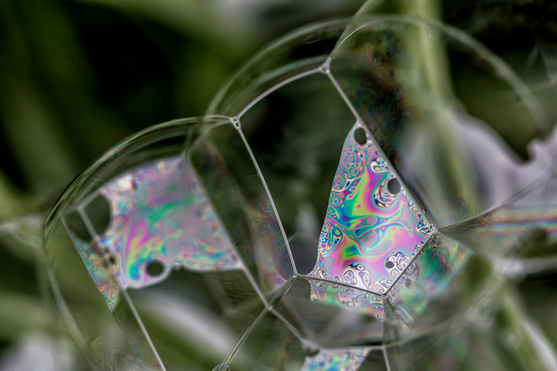 Hidden Patterns – Swirling patterns created by my daughter's bubbles reflecting light.